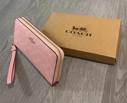 2026 Coach Long Zip Around Wallet in Signature Canvas CW778 Powder Pink | Women's Designer Wallet