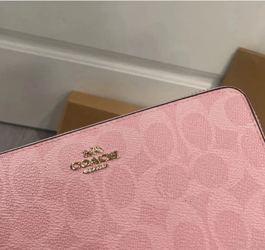 2026 Coach Long Zip Around Wallet in Signature Canvas CW778 Powder Pink | Women's Designer Wallet
