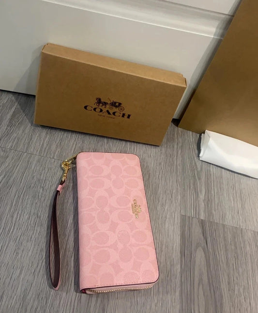 2026 Coach Long Zip Around Wallet in Signature Canvas CW778 Powder Pink | Women's Designer Wallet